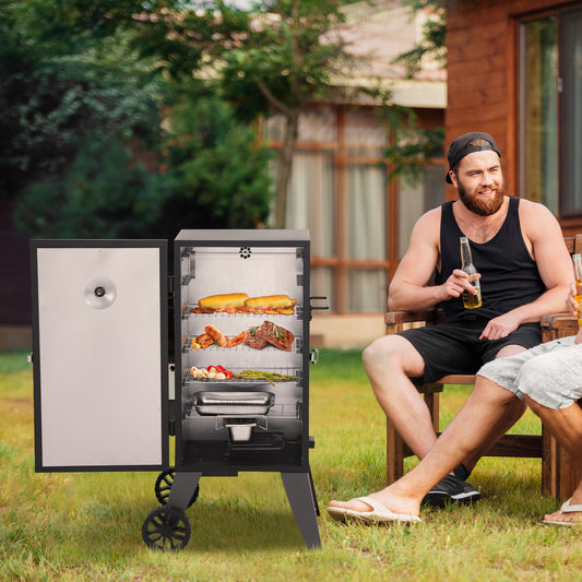 Man sitting outdoors with a beer, next to a Royal Gourmet portable barbecue grill with food inside.