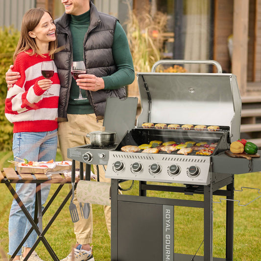Couple grilling outdoors with a Royal Gourmet barbecue