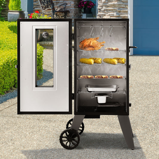 A large outdoor Royal Gourmet electric smoker grill with the door open, showing a roasted chicken, corn on the cob, and small burgers on racks inside. The grill has a black frame, a silver interior, and wheels at the base, photographed outdoors on a paved surface with garden and house elements in the background.
