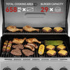 A stainless steel Royal Gourmet gas grill shown open with food cooking on the grates: chicken legs, steaks, sausages, asparagus, corn, and burgers with cheese. Large overlaid text at the top reads 'TOTAL COOKING AREA 658 SQ IN.