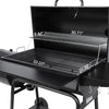 Black barbecue grill with measurements indicated on a white background