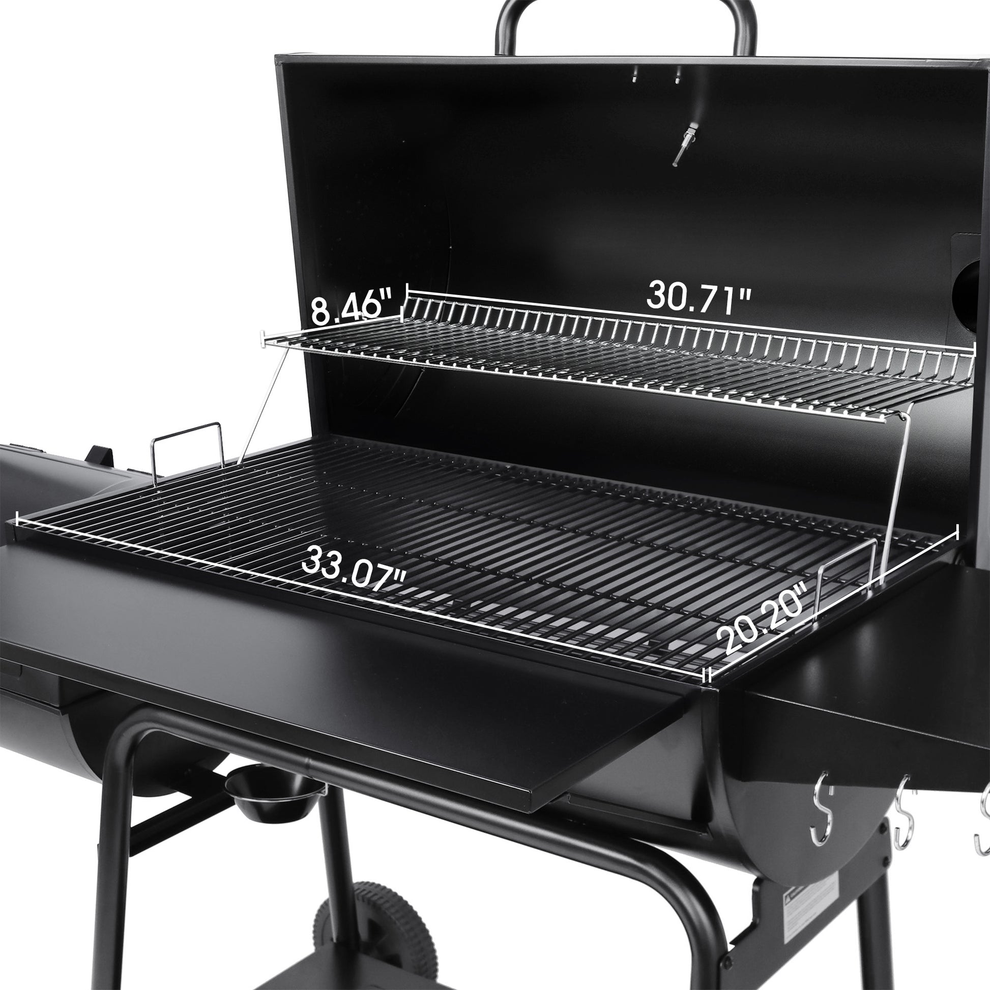 Black barbecue grill with measurements indicated on a white background