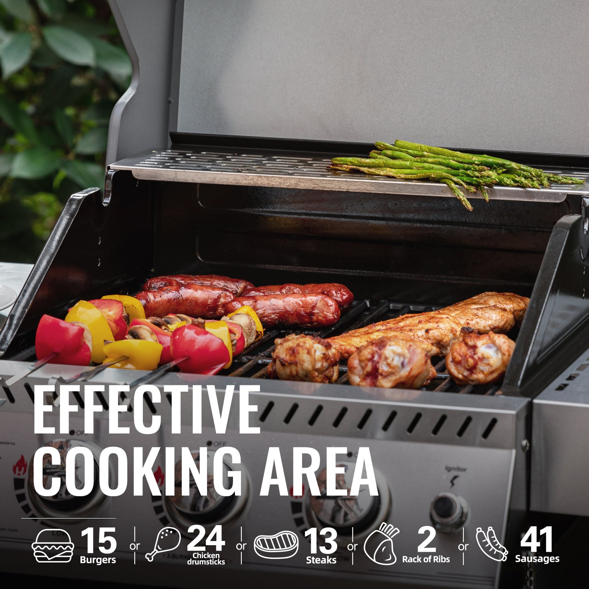A charcoal Royal Gourmet grill with the lid open, showing food cooking on the grates: burgers, chicken nuggets, steaks, ribs, sausages, and asparagus. Large white text reads 'EFFECTIVE COOKING AREA' across the lower front, with smaller cooking-capacity icons along the bottom edge.