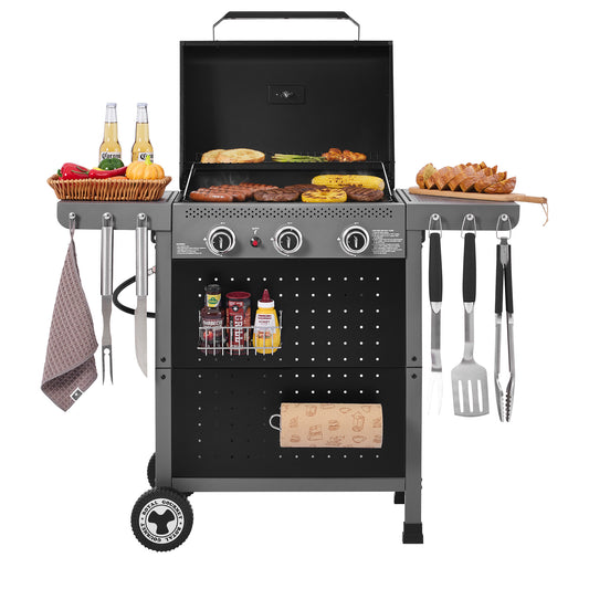 Royal Gourmet Barbecue grill with food, bottles, and utensils on a white background