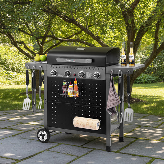 Royal Gourmet Black barbecue grill with accessories on a patio