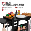 Black portable folding work table with a detachable side shelf, shown loaded with food prep items, bread, bottles, and hanging utensils. Text at the top reads '640 SQ.