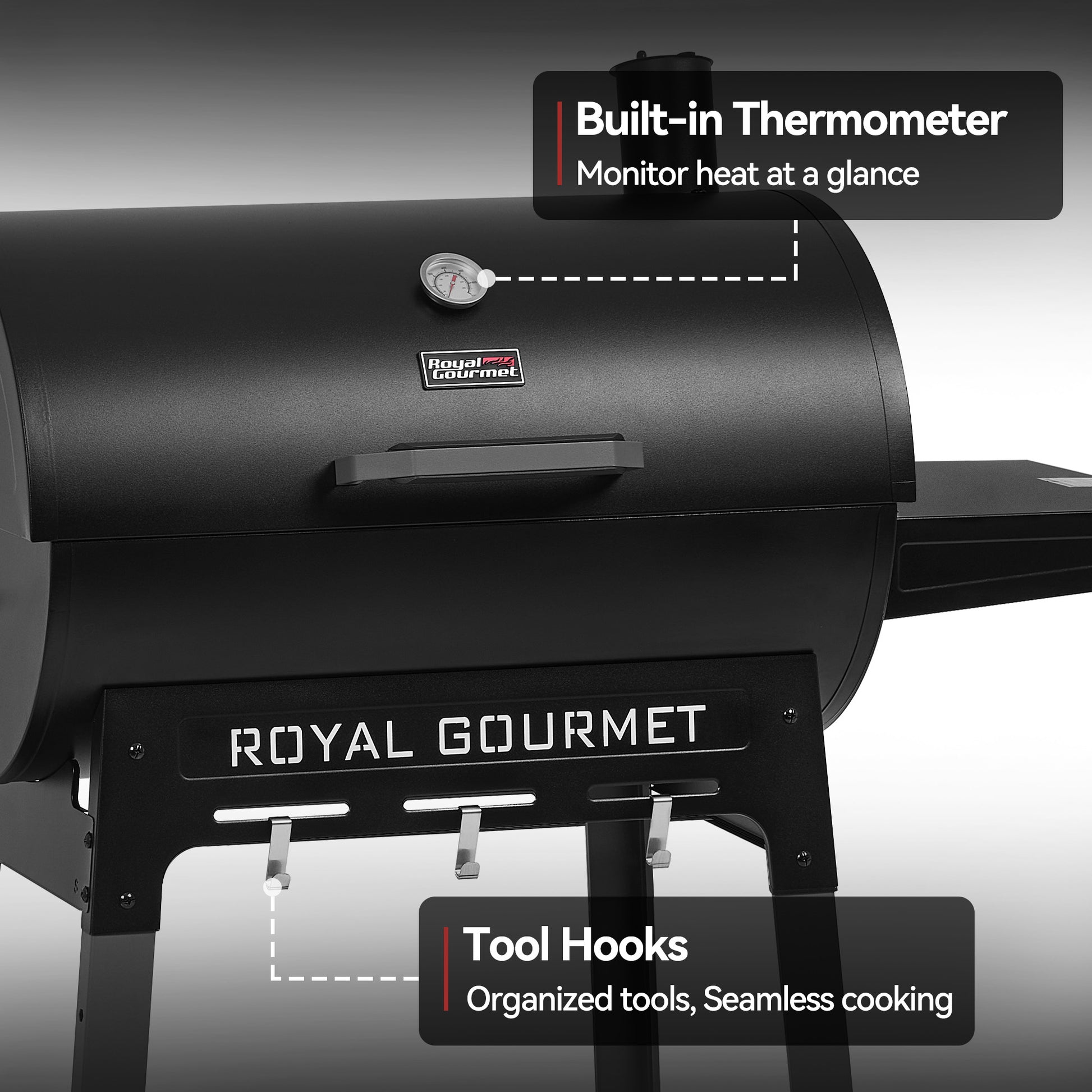 Black Royal Gourmet grill with built-in thermometer and tool hooks on a gray background