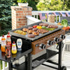 Royal Gourmet Outdoor grill with food and condiments on a patio