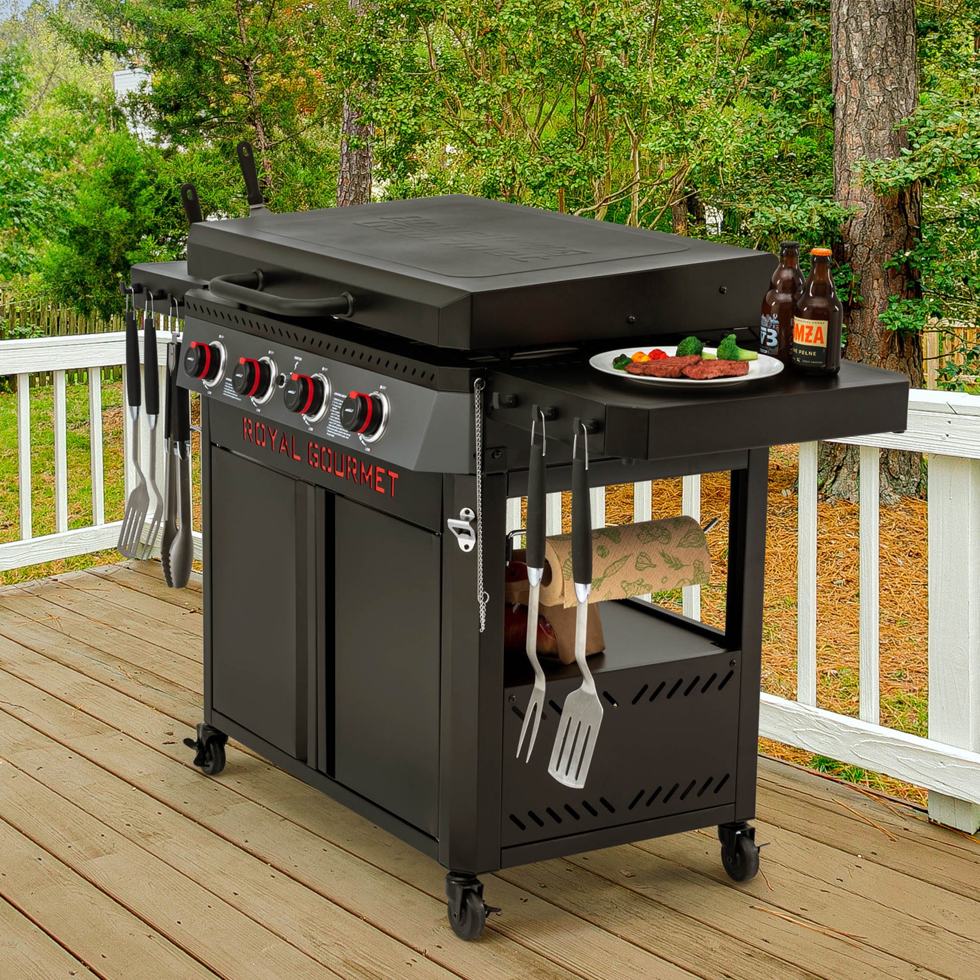 Black Royal Gourmet  barbecue grill with cooking utensils and food on a wooden deck