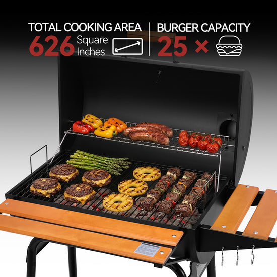 A black outdoor Royal Gourmet gas grill with an open lid and extended wooden side tables, shown cooking burgers, steak skewers, asparagus, peppers, and tomatoes. White and red text at the top highlights cooking area and burger capacity, with a black-to-gray gradient background.
