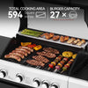 A stainless steel and black Royal Gourmet gas grill shown open with food cooking on the grates and a secondary shelf holding asparagus, chicken, and mushrooms. Large text at the top reads 'TOTAL COOKING AREA 594 Square Inches' and 'BURGER CAPACITY 27 x', with burger dimensions noted below.