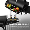 Royal Gourmet Black barbecue grill with prep space, fruits, vegetables, and Corona Extra cans on a white background