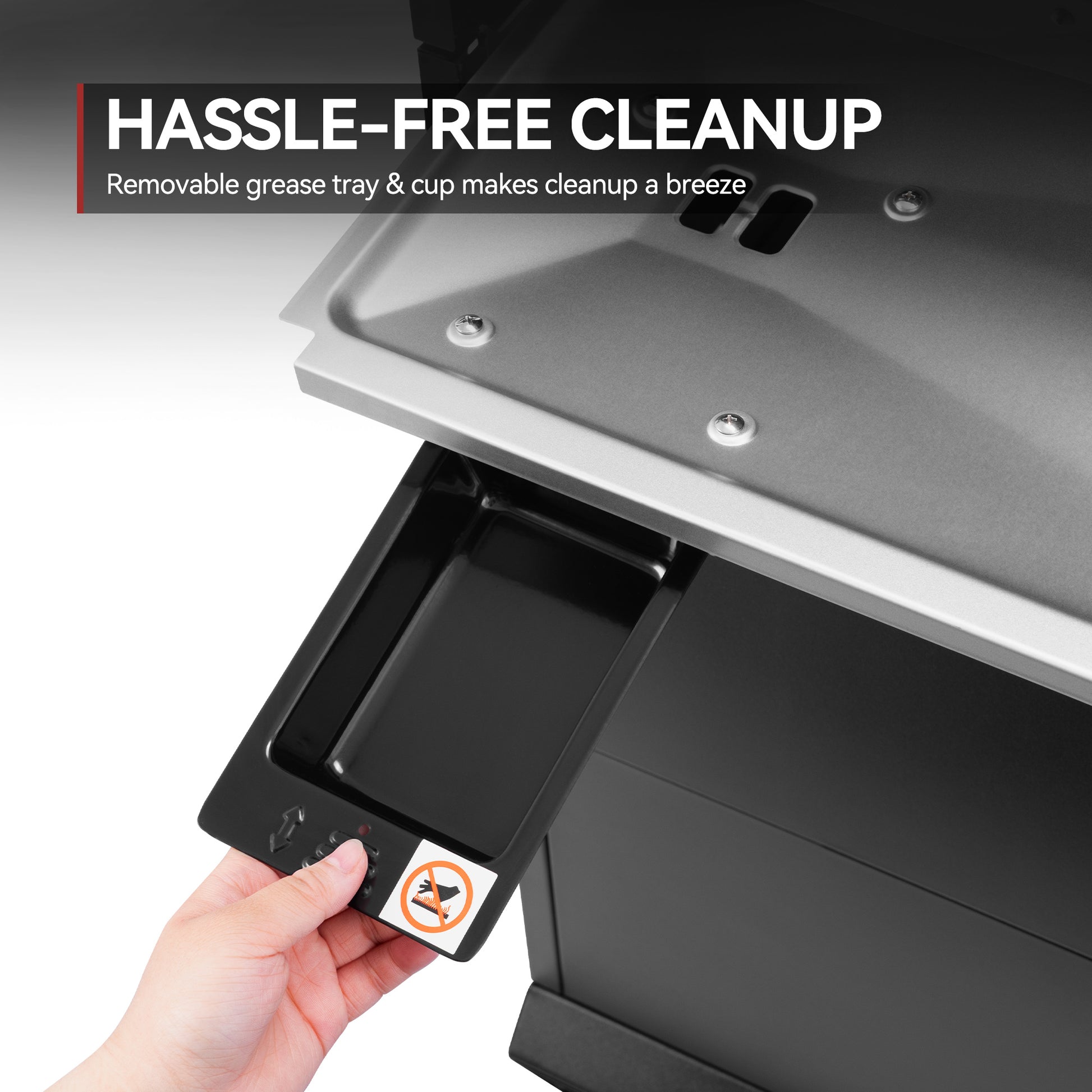 Removable grease tray being pulled out of a kitchen appliance with text 'Hassle-Free Cleanup' above.