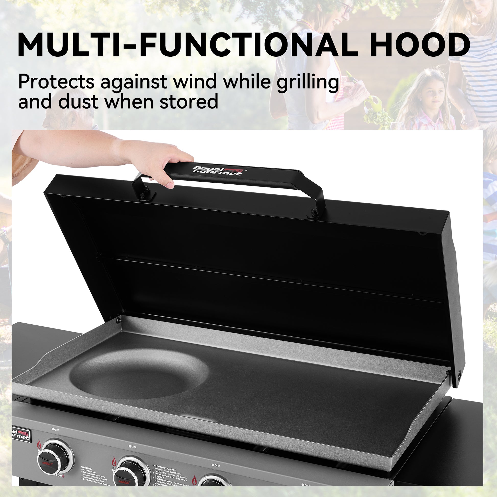 A black multi-functional outdoor Royal Gourmet grill hood with a hand lifting the handle, shown open to reveal a flat griddle plate. The image includes text overlays reading 'MULTI-FUNCTIONAL HOOD' and 'Protects against wind while grilling and dust when stored' with a faded background of people outdoors.