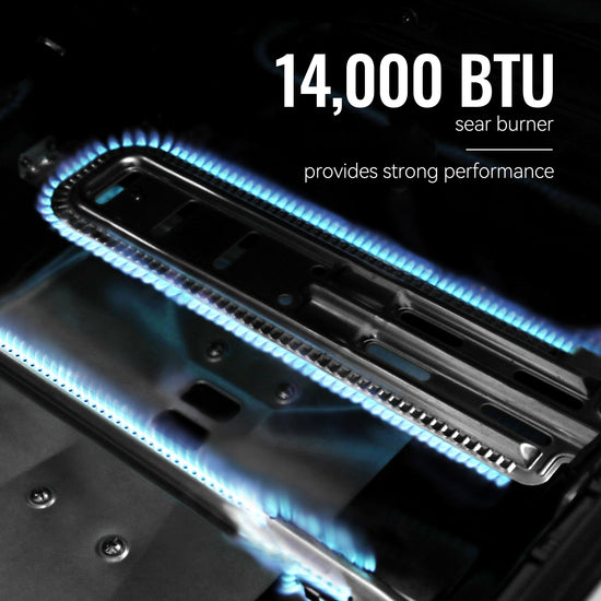14,000 BTU sear Royal Gourmet  burner with blue flames on a black background