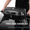 Royal Gourmet Portable grill with two side handles being held by a person, featuring the Royal Gourmet brand.