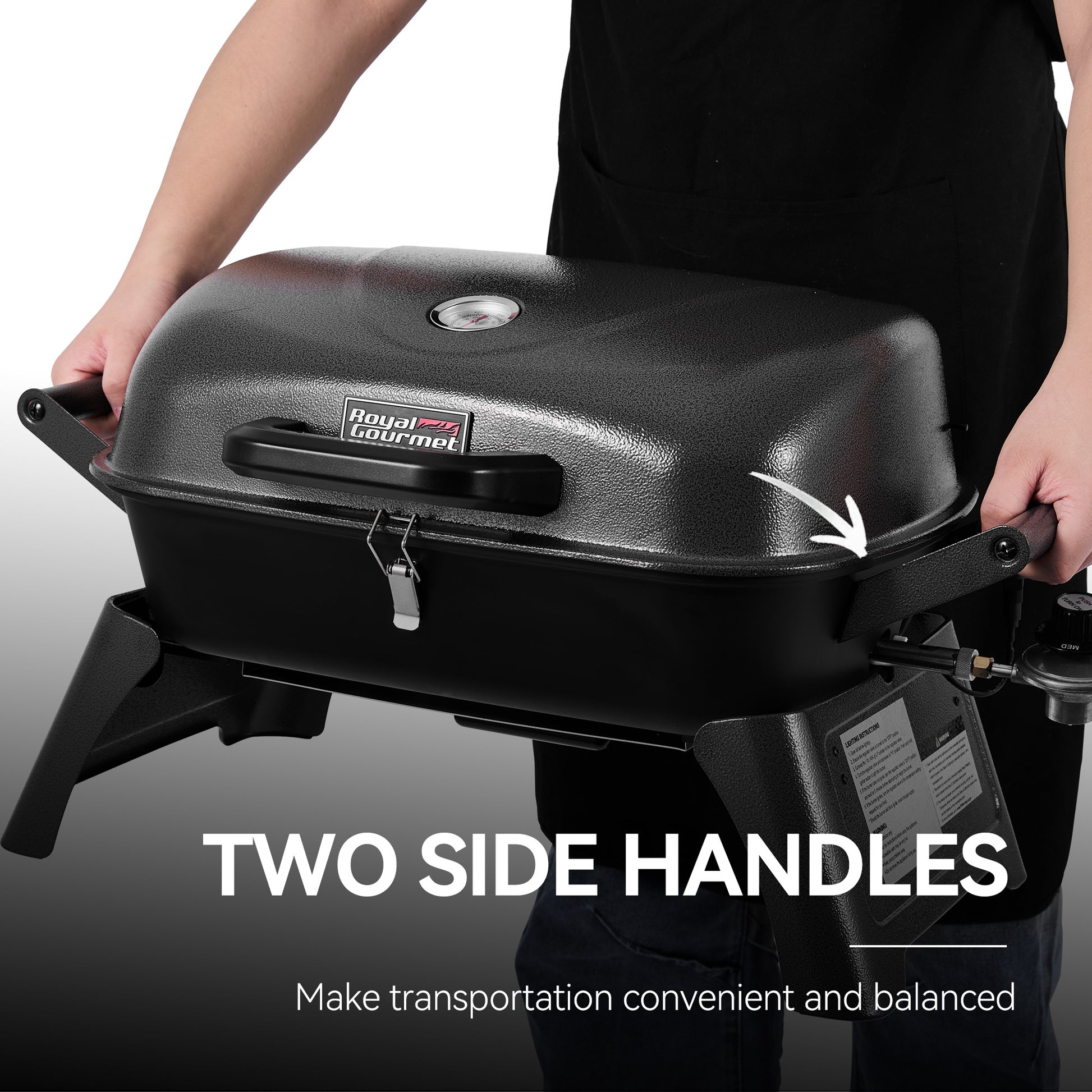 Royal Gourmet Portable grill with two side handles being held by a person, featuring the Royal Gourmet brand.