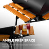 Royal Gourmet Barbecue grill with orange shelves and a bottle of ketchup on a white background