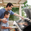 Royal Gourmet Man and child grilling together outdoors on a sunny day