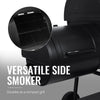 Black barbecue grill with a side smoker feature on a gray background