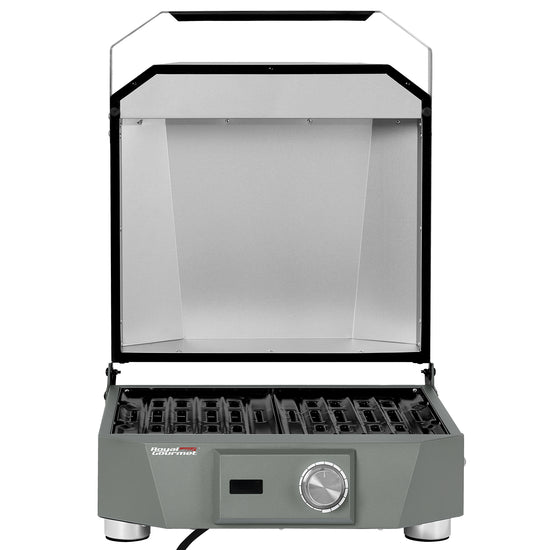 A portable indoor Royal Gourmet  grill with a gray body, black grates, and a clear acrylic lid, shown open against a white background.