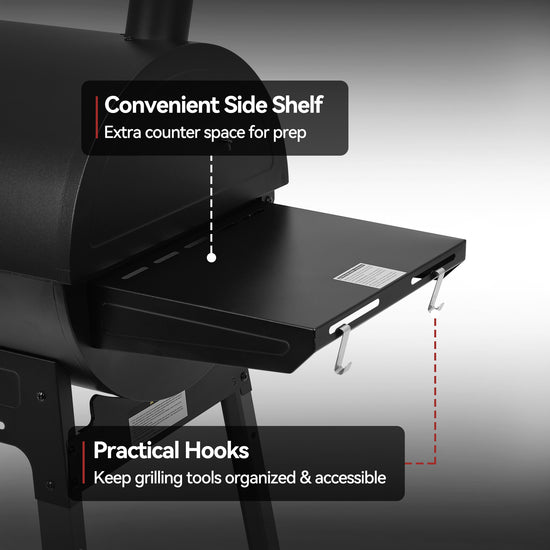 Black barbecue grill with a side shelf and hooks on a gray background