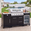 A black and stainless steel outdoor kitchen island with a built-in Royal Gourmet gas grill, drawers, a wine cooler, and countertop accessories, shown in a backyard patio setting.