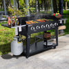 Black Royal Gourmet  barbecue grill with food and accessories on a patio