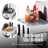 Stainless steel Royal Gourmet prep table with side shelf and burner, featuring condiments and food items.