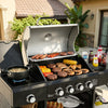 Royal Gourmet Gas grill with various meats, vegetables, and cooking utensils on a patio