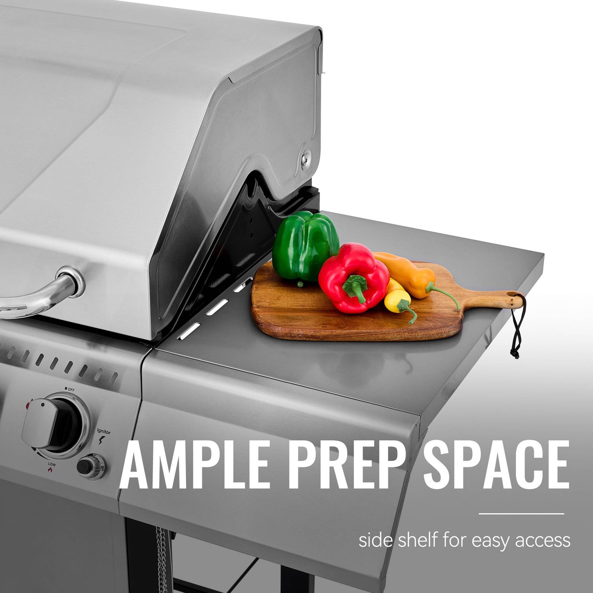 Grill with a side shelf featuring colorful peppers on a cutting board, text 'AMPLE PREP SPACE' displayed.