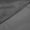 Close-up of gray fabric with a zipper