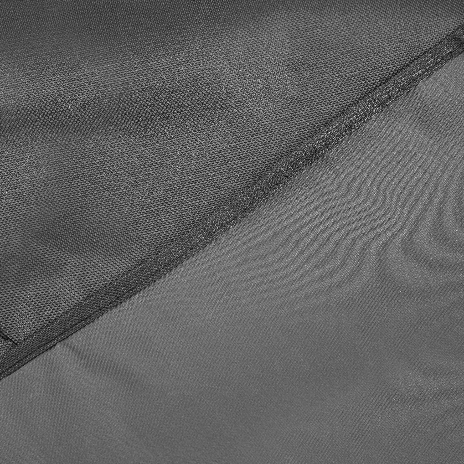 Close-up of gray fabric with a zipper