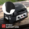 Black portable Royal Gourmet gas grill with support legs on a wooden table, featuring a circular inset showing the underside of the lid and text reading 'STABLE SUPPORT LEGS'.