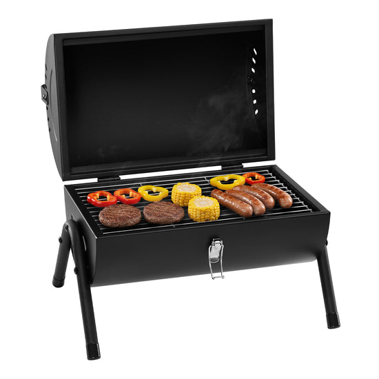 Royal Gourmet Black portable grill with food items on a white background