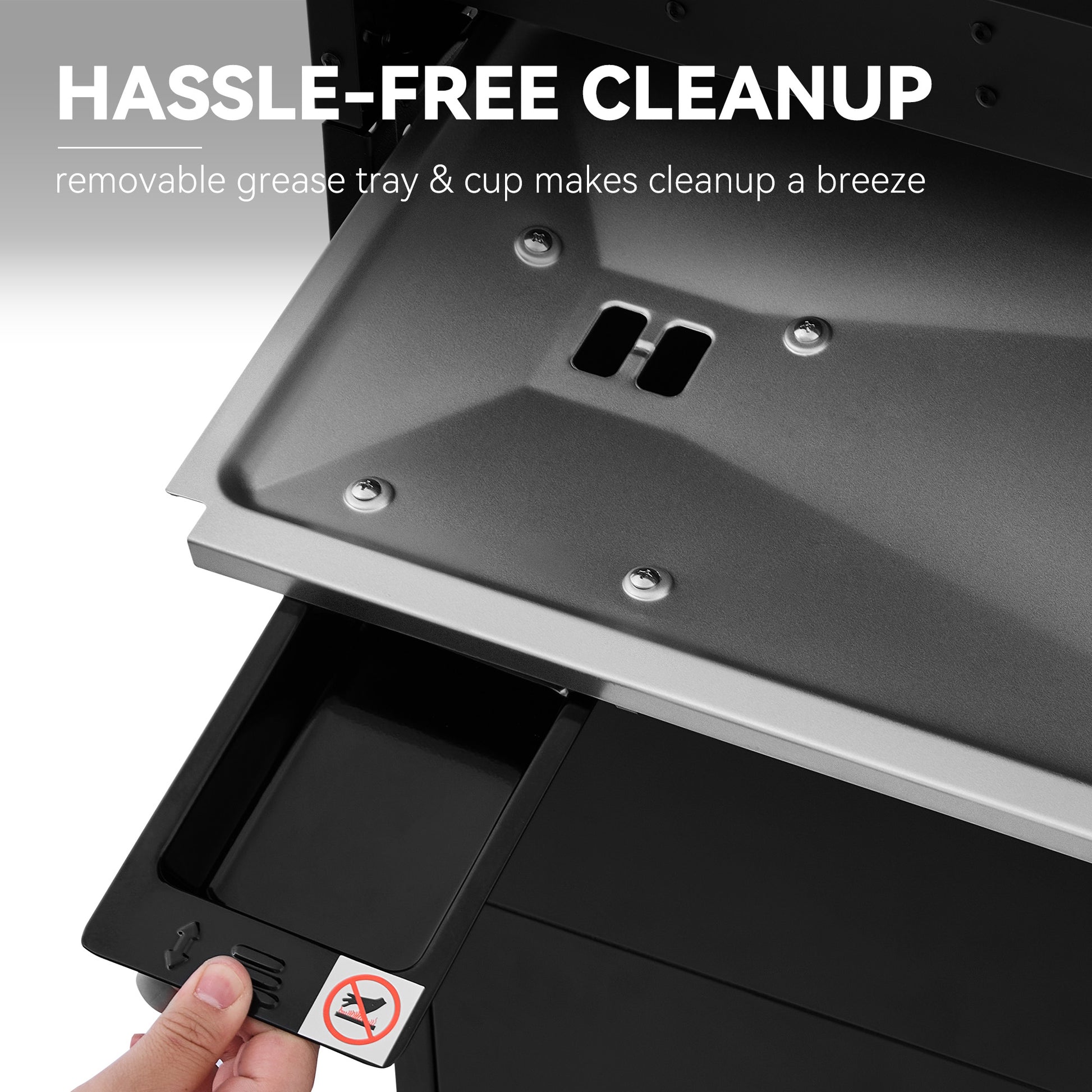 Removable grease tray and cup for hassle-free cleanup on a kitchen appliance.