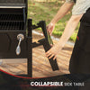 Collapsible side table being attached to a Royal Gourmet grill with a person's hand visible.