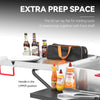 Creole Feast Extra prep space with tools, bottles, and a bag on a gray background