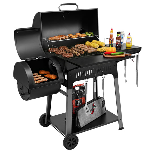 Royal Gourmet Black barbecue grill with food and accessories on a white background