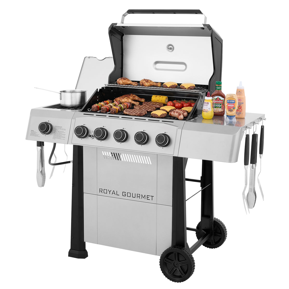 A Royal Gourmet gas grill with an open lid, shown on a white background with food cooking inside and condiments on the side table.
