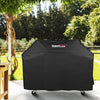 Black barbecue grill cover with 'Royal Gourmet' logo on a patio