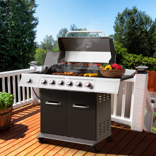 Royal Gourmet Gas grill on a wooden deck with outdoor setting
