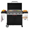 A black Royal Gourmet gas grill with an open lid, shown on a white background with food and grilling accessories arranged around it. The grill has a flat top griddle with fries, steak, asparagus, and eggs, and side tables holding fruit, bread, towels, and utensils.