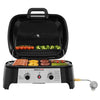 A black and silver Royal Gourmet portable propane grill with food cooking on it, shown open against a solid white background. A propane regulator is connected to the side.