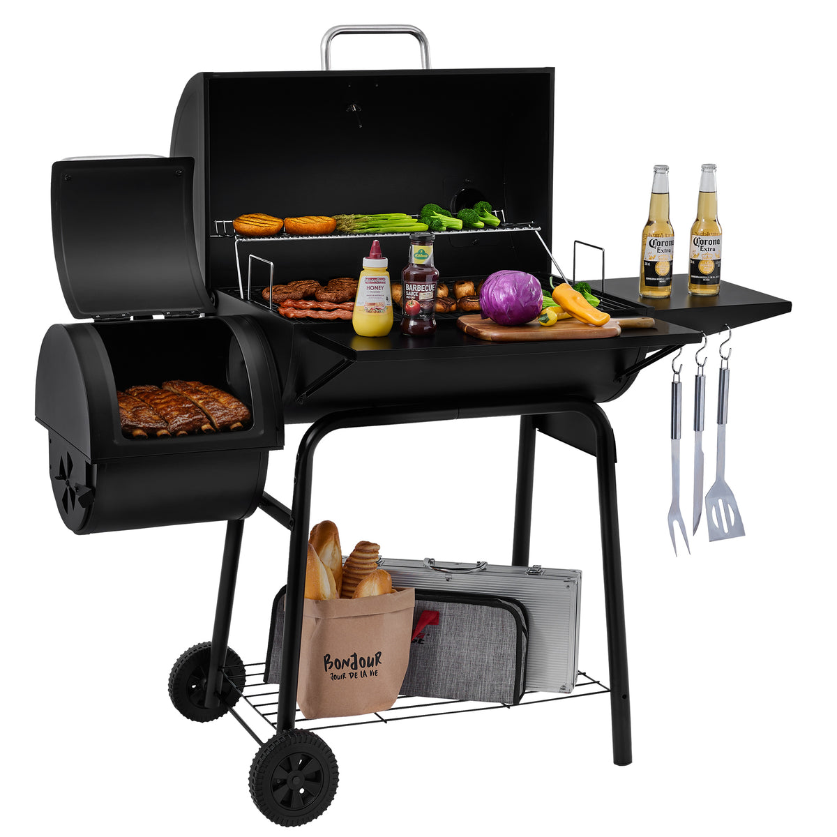 A black Royal Gourmet charcoal grill with a side burner, shown on a white studio background with food, bottles, utensils, and accessories arranged around it. No person or real environment is present, so this is Product/Packaging rather than Lifestyle.
