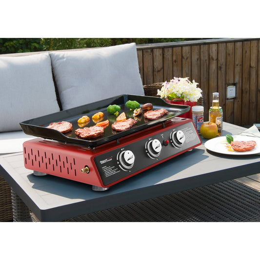 Royal Gourmet  Portable outdoor grill with food on a patio table